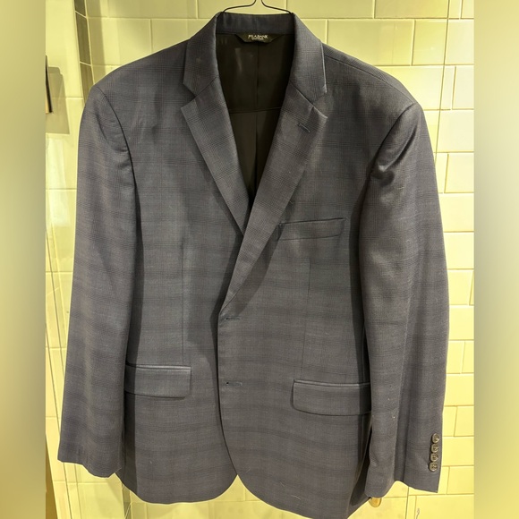 Jos. A. Bank Travelers navy suit with matching pants. 43R
